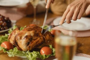 turkey on a platter being carved